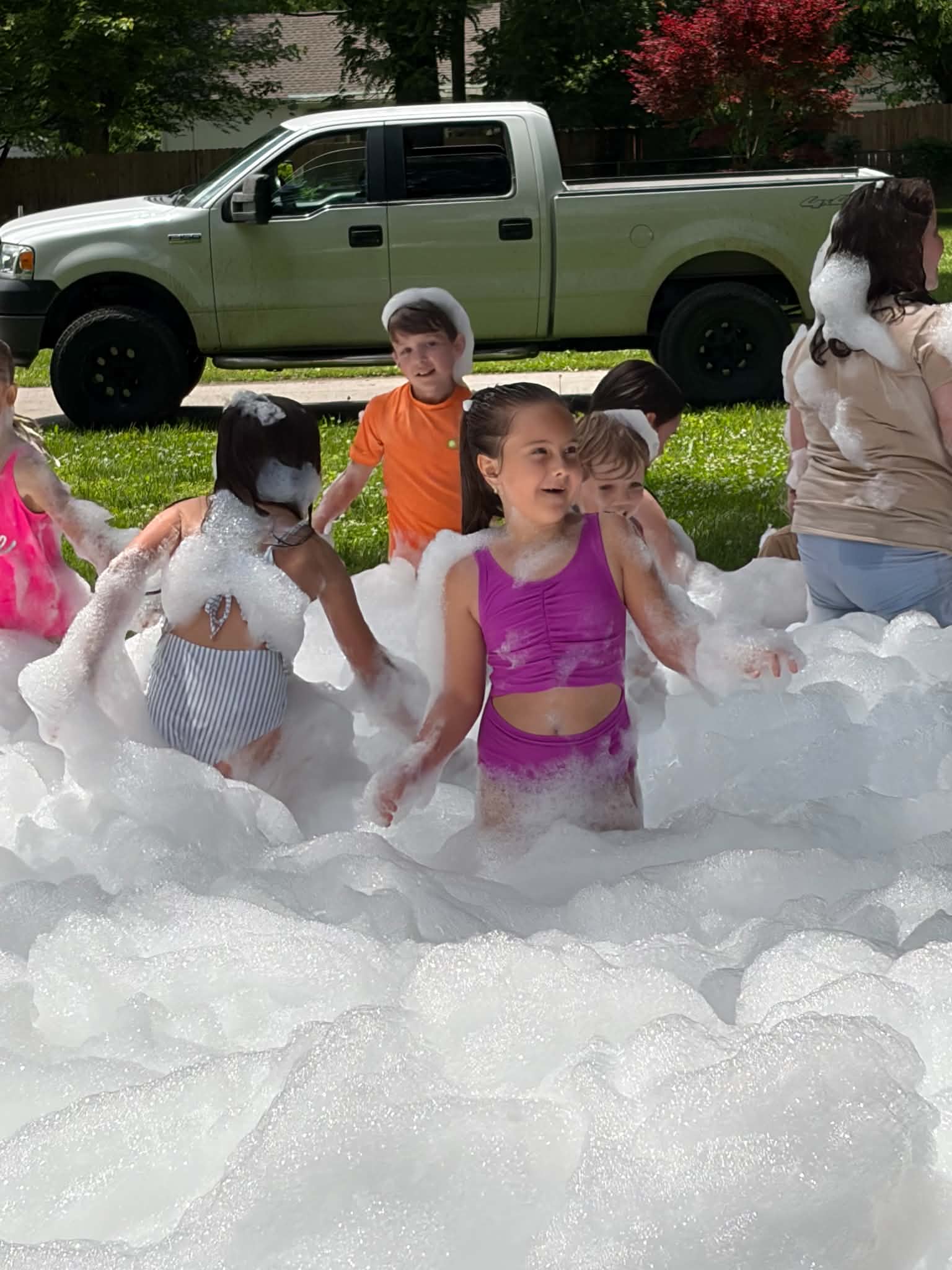 Group of kids playing in deep foam