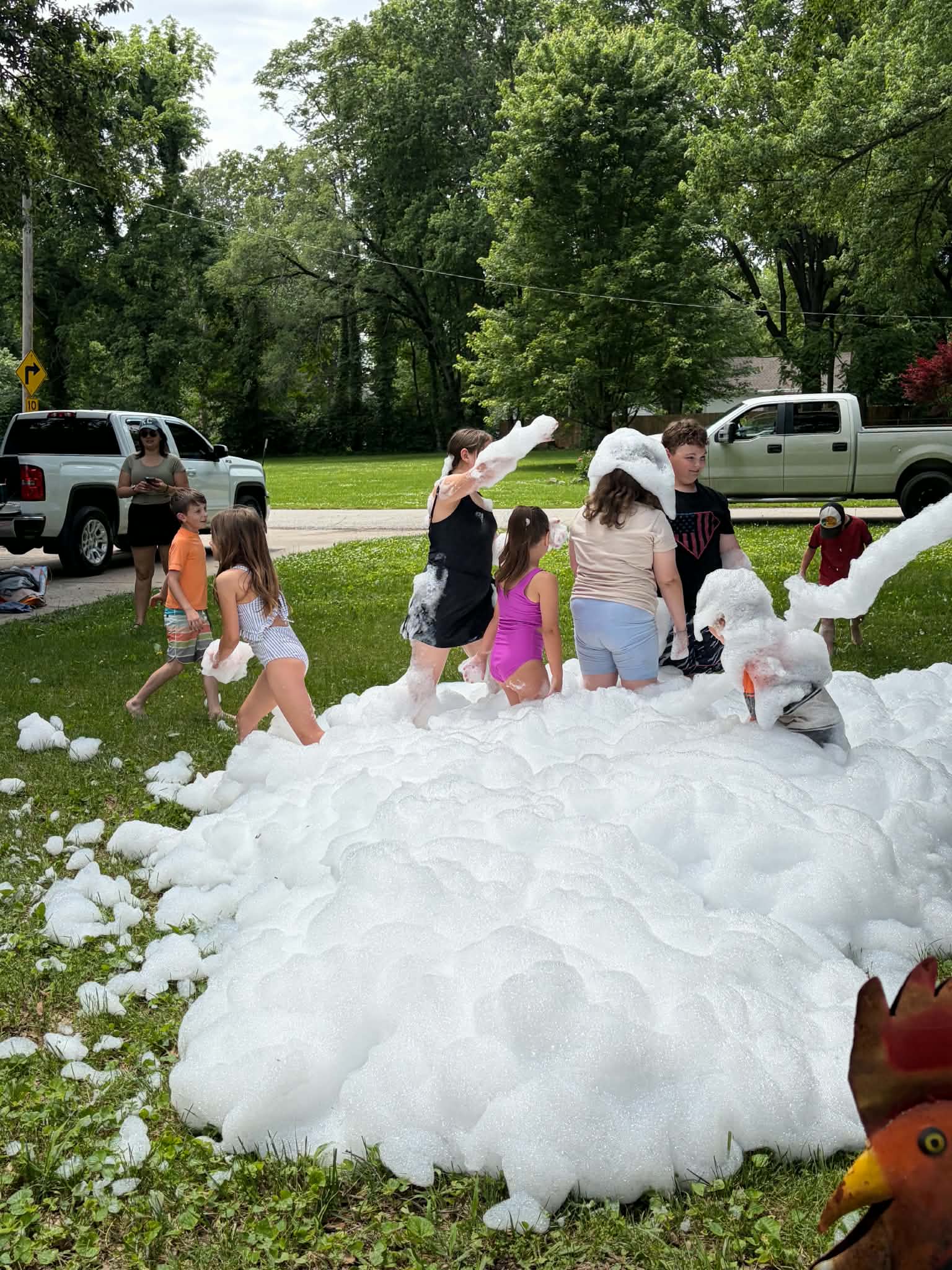 Kids wading through a big pile of foam