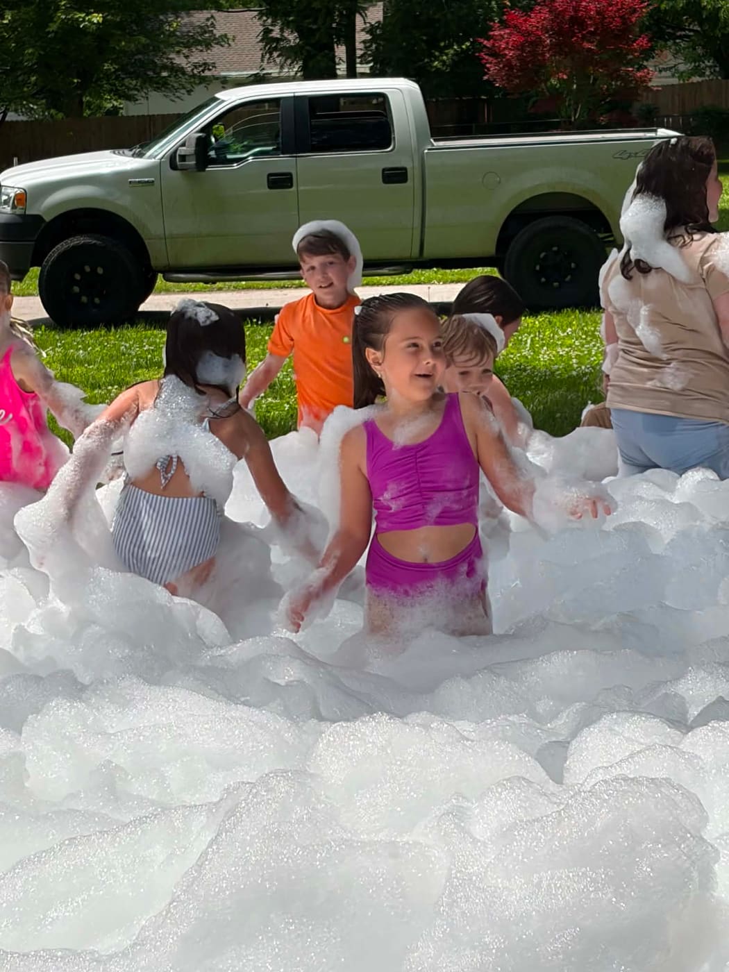 A group of kids playing in deep foam
